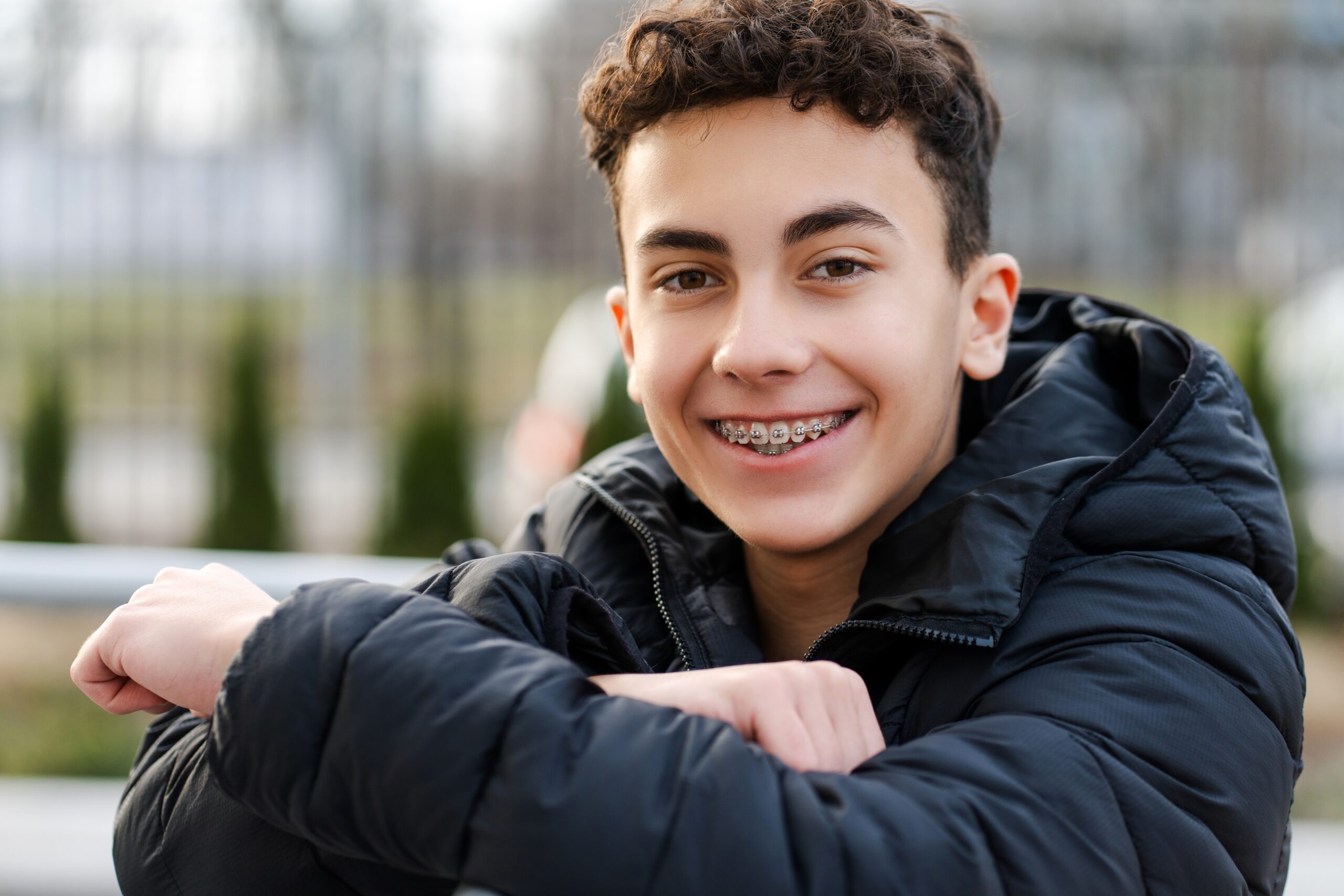 Portrait,Of,Positive,Happy,Boy,,Handsome,Teenager,With,Braces,Looking